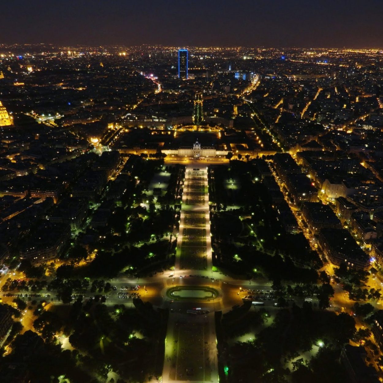 Night view of the city of Paris from the top floor of the Eiffel Tower.